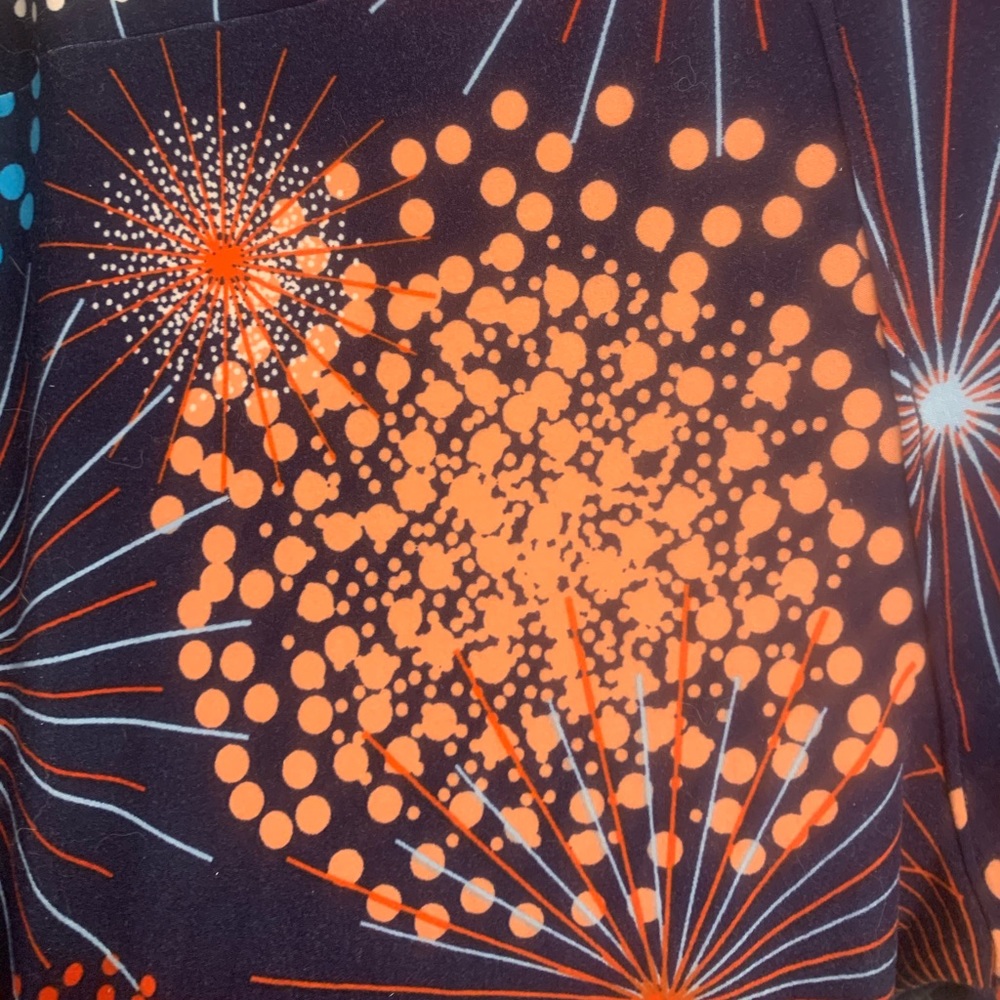 LuLaRoe Fireworks Leggings TC. Blue background